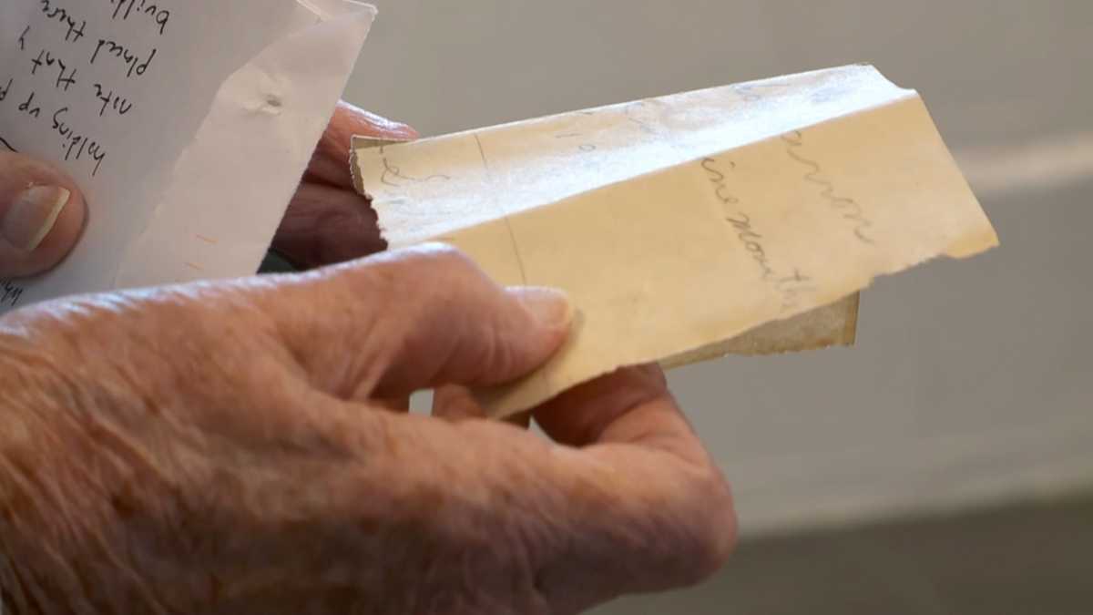Centenarian explores childhood home after note found in a wall [Video]