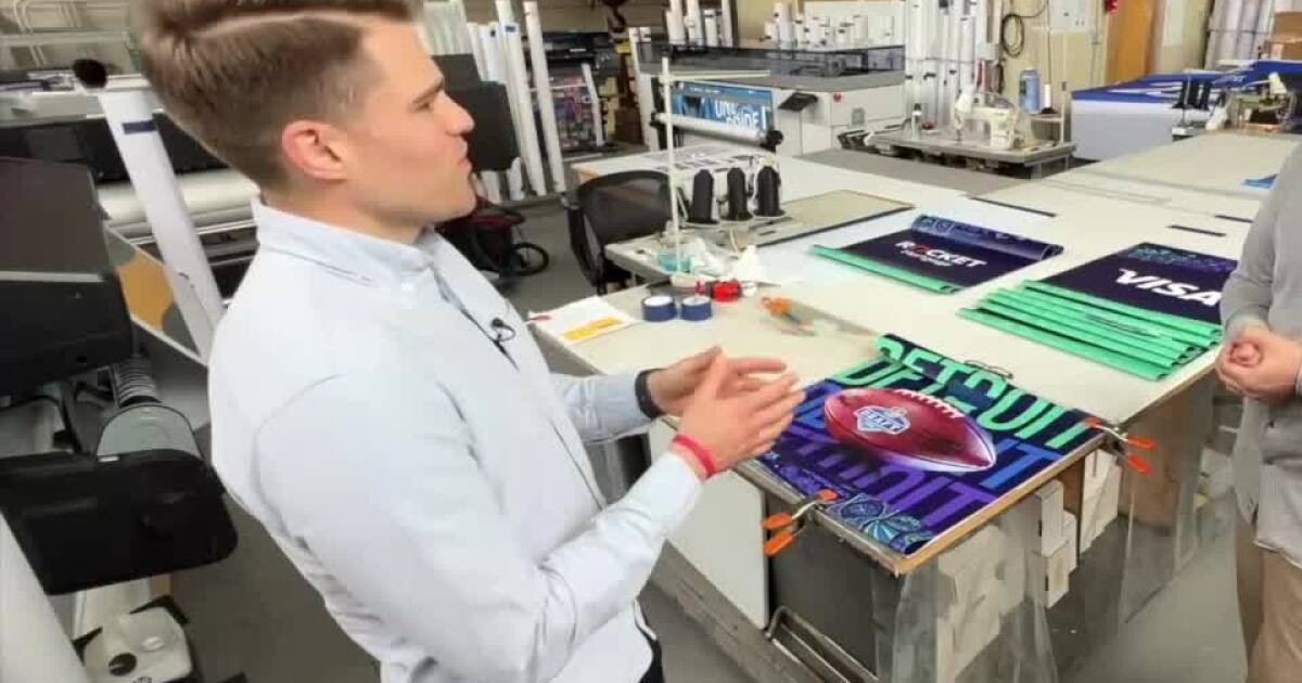 A look inside Detroit-based Banner Sign Co as they make banners for NFL Draft [Video]