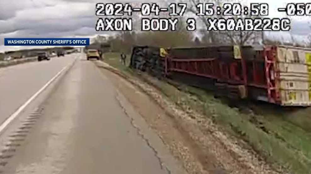 Truck driver nearly runs sheriff off road, rolls semi over [Video]