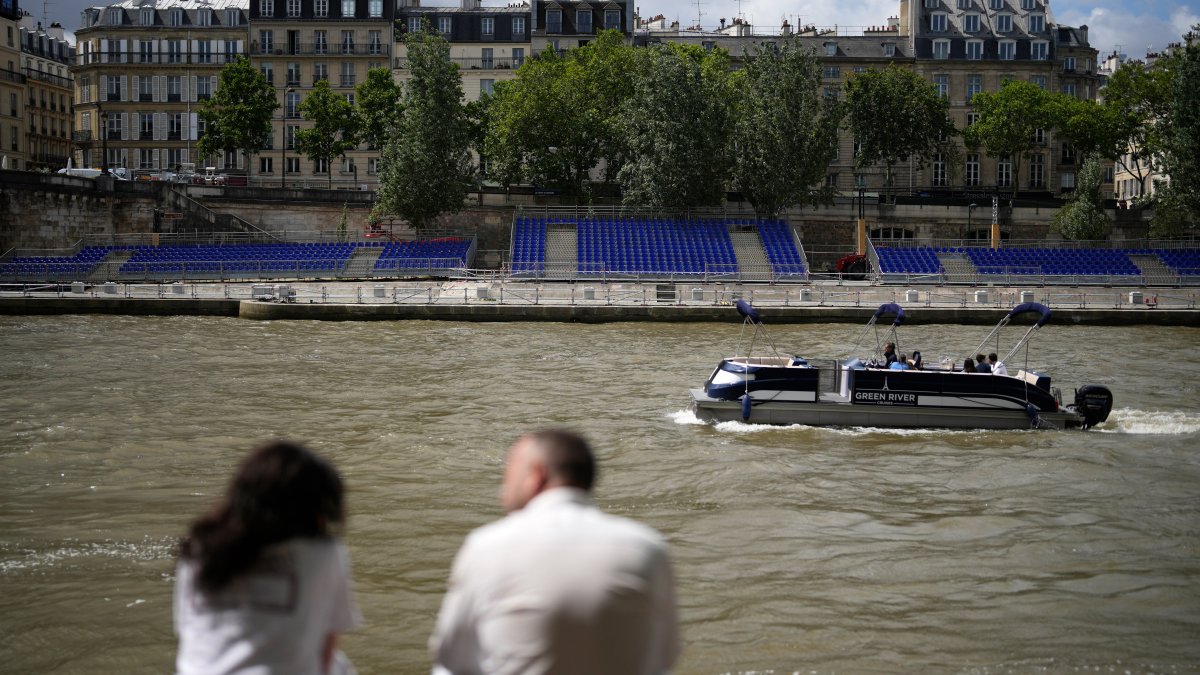 French sports minister swims in Seine River ahead of Paris Olympics  NBC Los Angeles [Video]