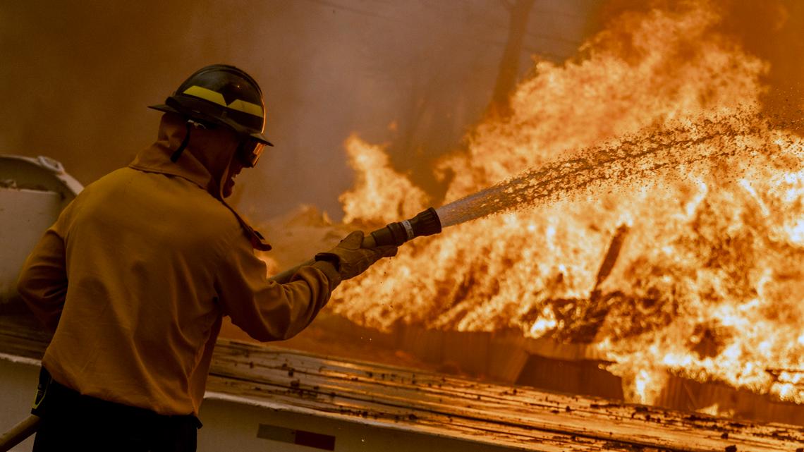 California wildfire sparked by burning car triples in size [Video]