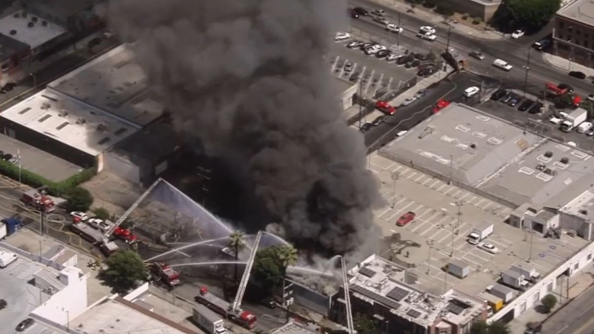 Firefighters respond to flames and explosions at downtown LA business  NBC Los Angeles [Video]