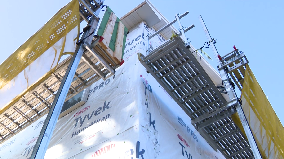 Volunteers team up with state leaders to build house for family in need in Worcester [Video]