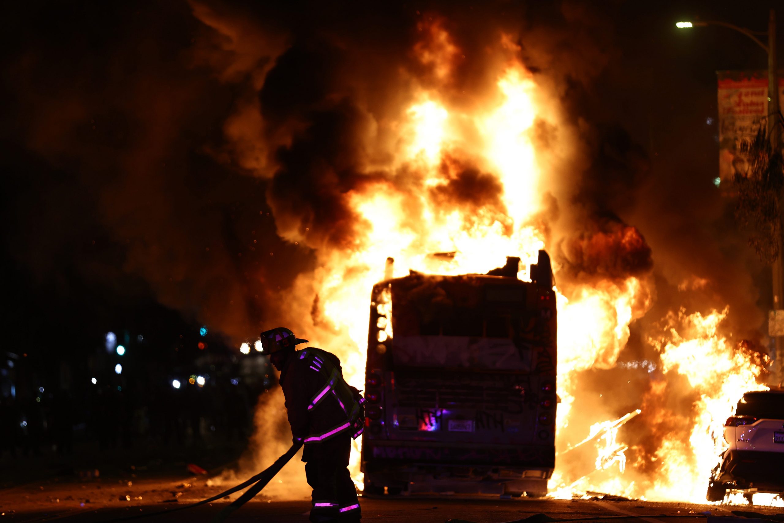 Arrests made after L.A. businesses looted, bus set on fire [Video]