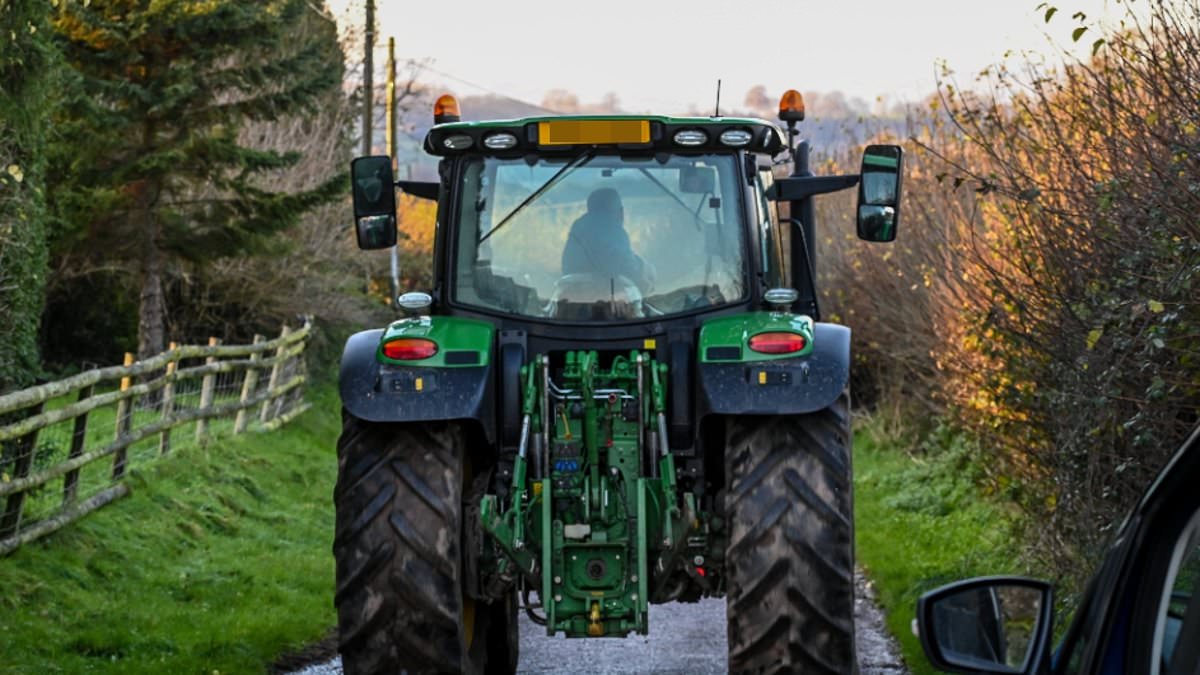 Tractor at centre of flooding storm gets back to work after driver, 57, was arrested for speeding through flooded town and devastating businesses [Video]